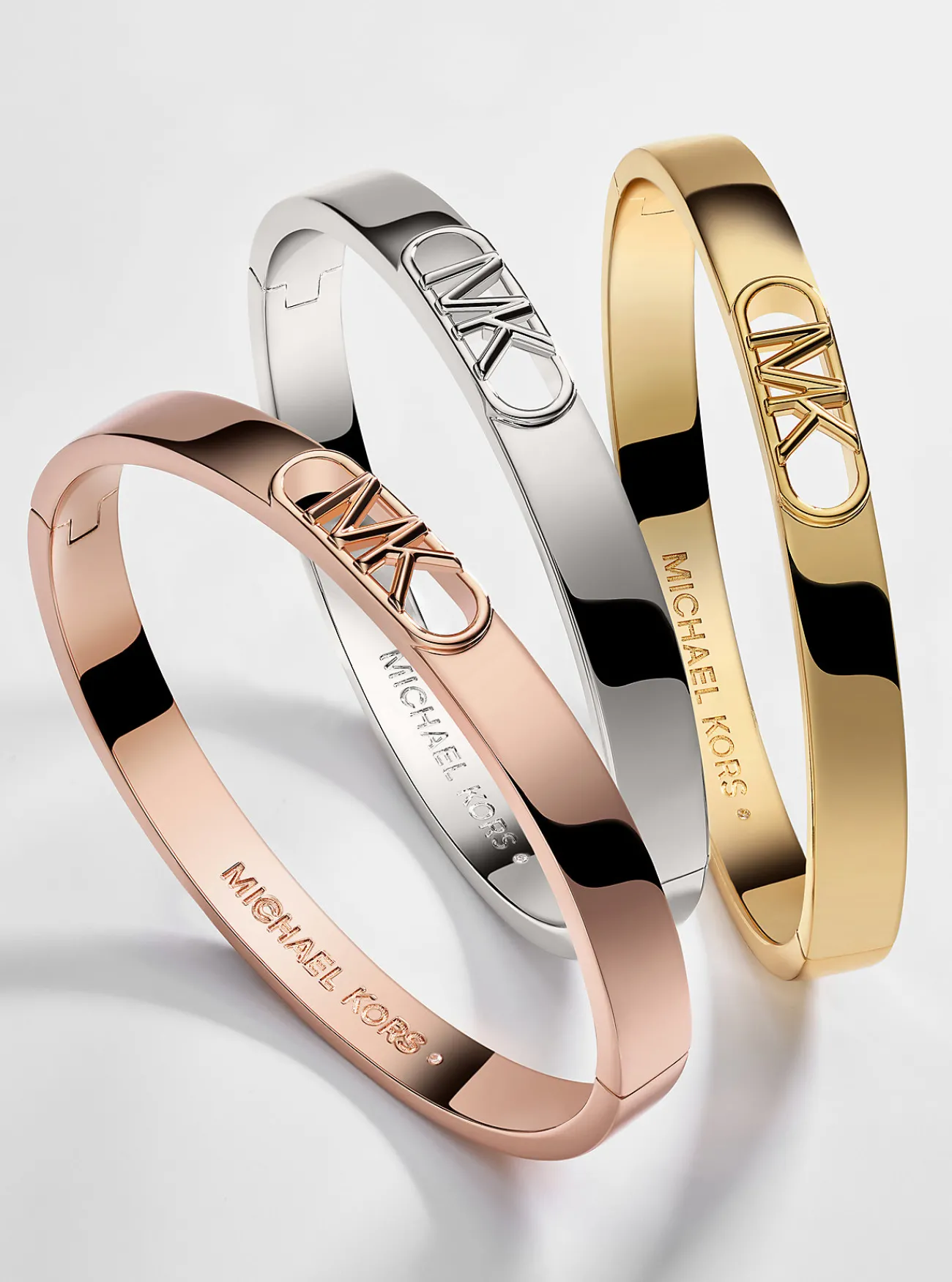 Michael Kors Bangle van messing met een platering met edelmetaal en Empire-logo GOUD Online